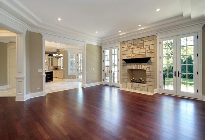 cozy bedroom with warm, rich hardwood flooring